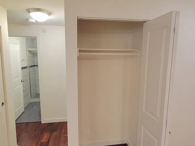 Coat and shoe closet in entry.