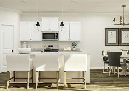 The kitchen has stainless steel appliances