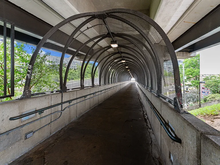 Walk down the metro tunnel to a park