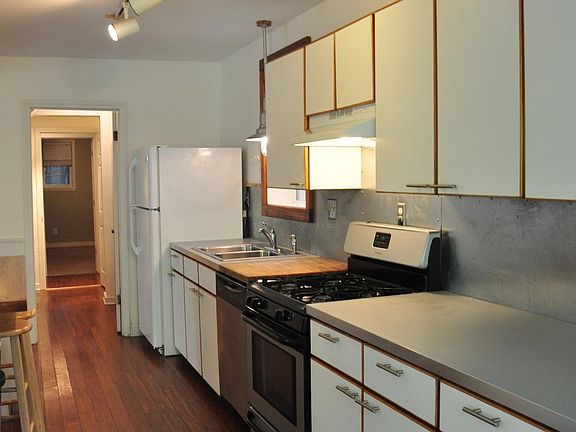 Kitchen showing study & bathroom beyond