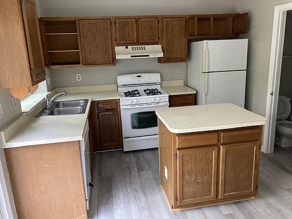 Kitchen (all new luxury vinyl tile here and throughout the house)