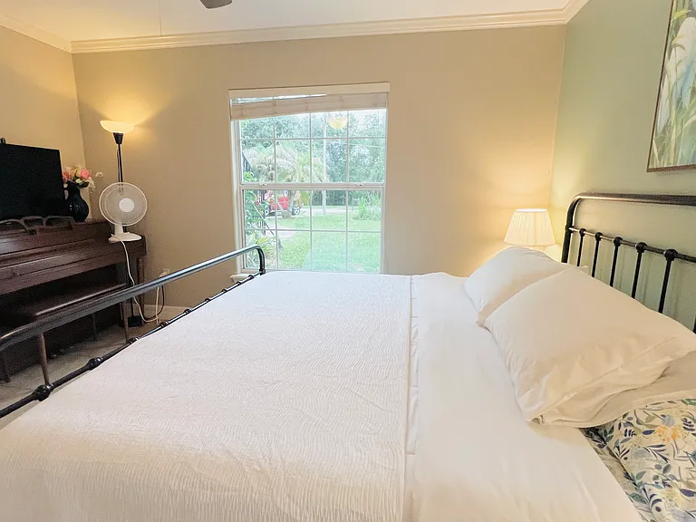 The first bedroom with piano