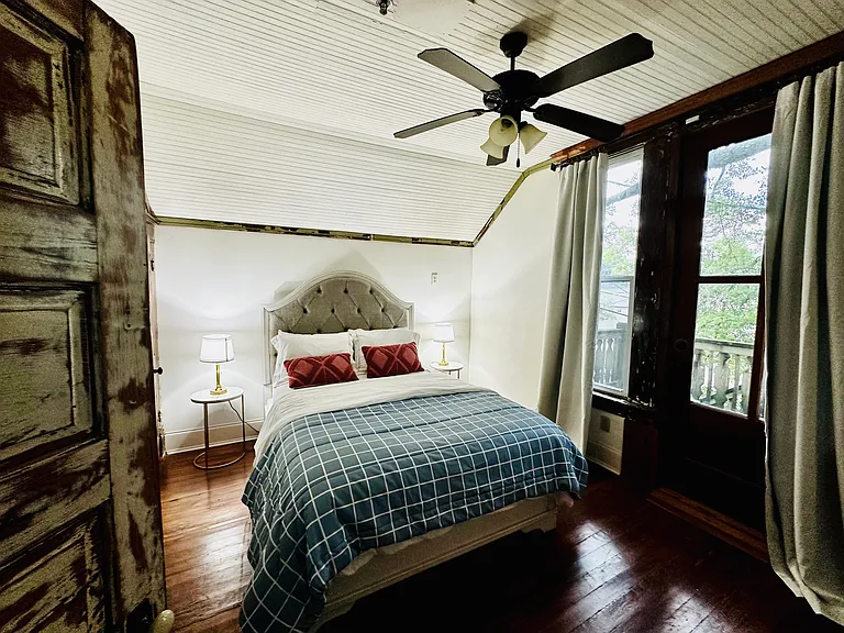 Master Bedroom with Queen Bed and Smart Tv and Closter with Black out Curtains and ceiling fan