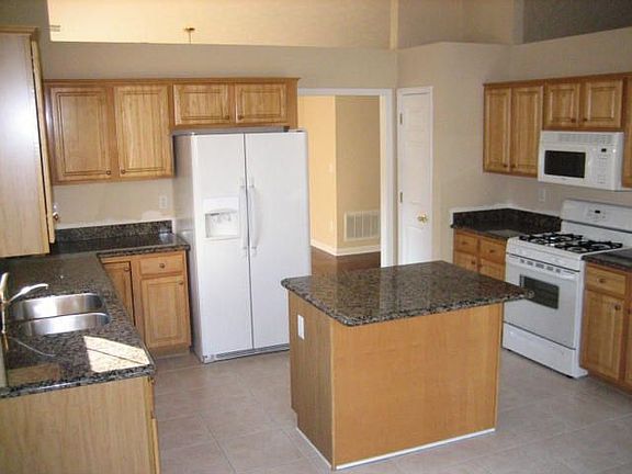 Totally updated kitchen w/ new granite, tile floor 