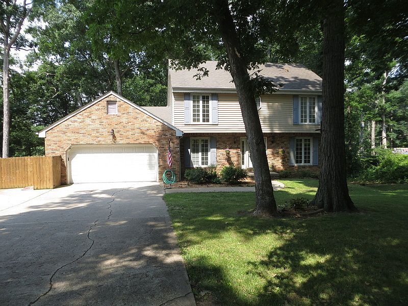 Front View of House
						:
						Modest looking from front, but come in and explore the vast spaces beyond!