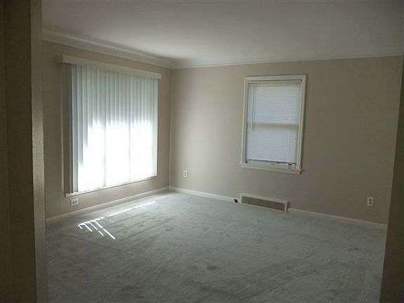 Freshly Painted Living Room w/ new carpet