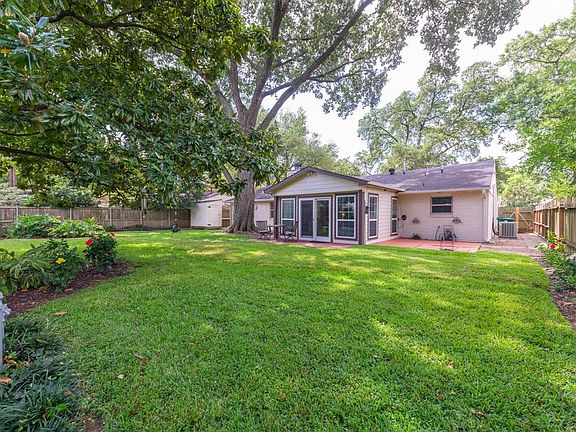 Beautifully landscaped and spacious back yard is perfect for playtime or entertaining your guests!