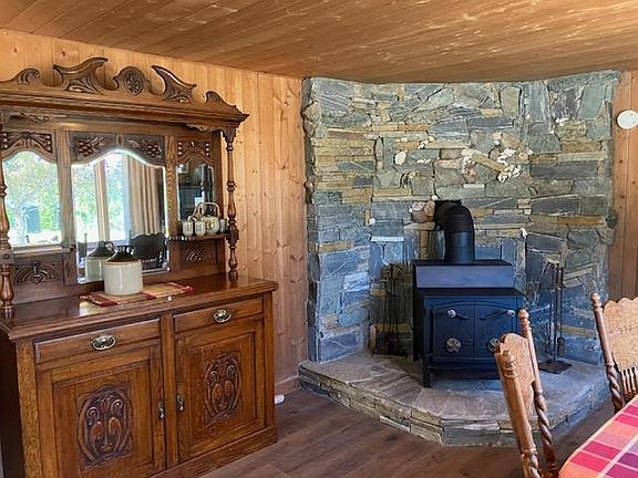 Get cozy around a huge refurbishged Fisher wood stove the best, Cottage has free split fire wood to burn!