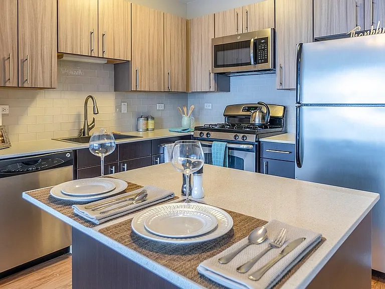 "Upgraded" Units: Kitchen space features modern backsplashes, cabinetry, and other luxury style features