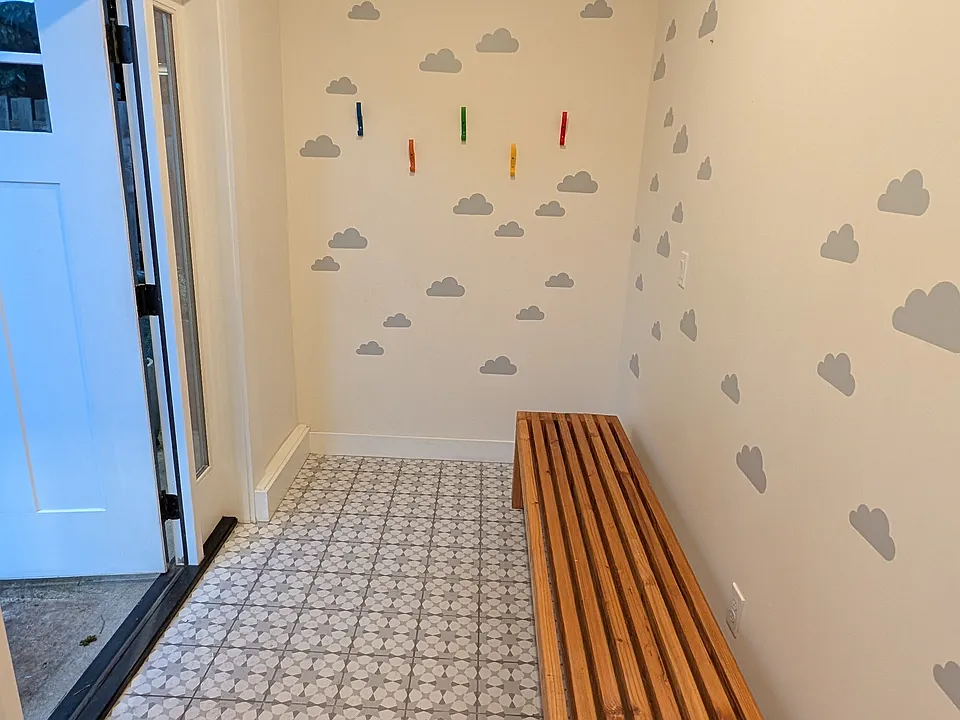 First floor entry and coat hooks (bench included and stays with unit)