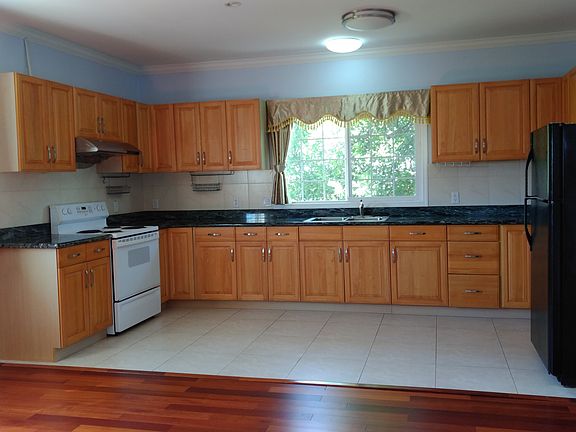 Huge kitchen even bigger living room.