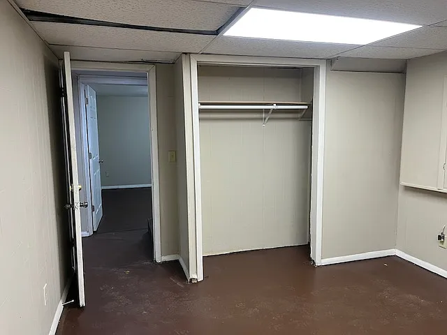 Larger of the 2 bedrooms. The closet has a curtain door now.