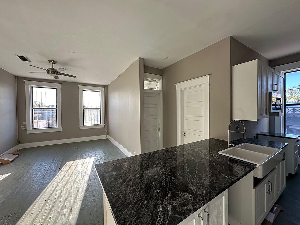 kitchen and view to living and bedroom 1 door
