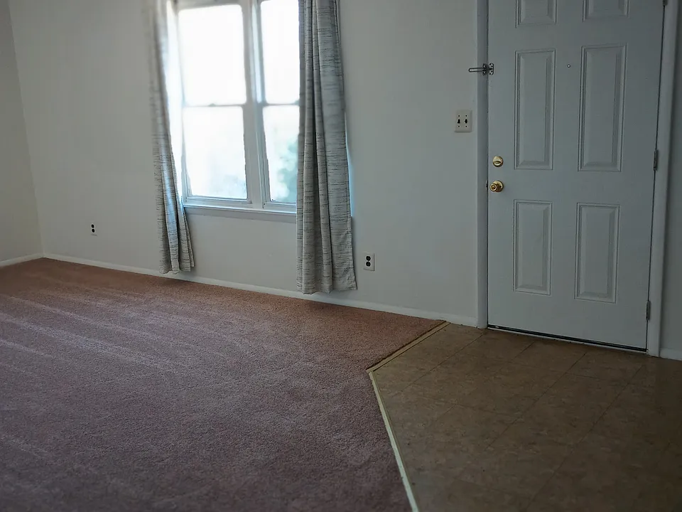 Living room showing entry door