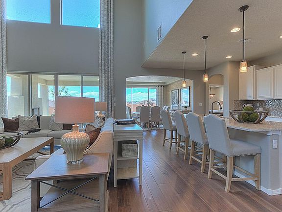 Open home layout showing the kitchen and spacious gathering room.