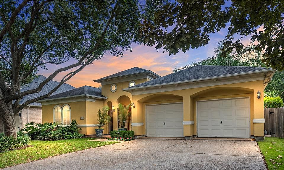 Wonderful curb appeal on this sprawling home located in gated community right off of Eldridge Parkway! From the street you would never guess that almost all of the rooms in the home face upon a wonderful courtyard with resort style pool!