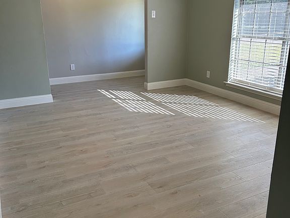 Formal dining into front entry and kitchen