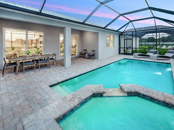 Screened-in lanai with pool spa