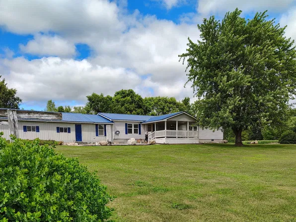 8888 Drew Dr, Six Lakes, MI 48886
