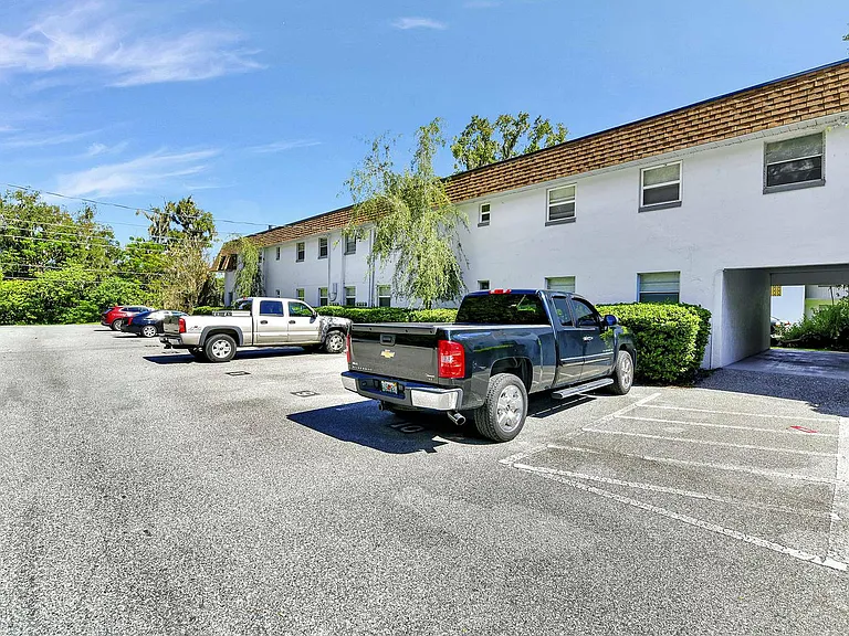 Experience comfortable living with ample parking and scenic surroundings.