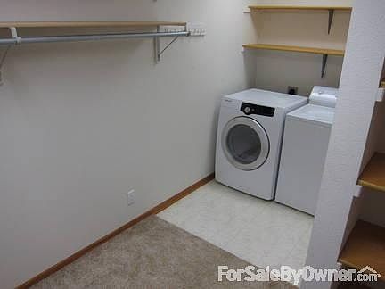 Washer/dryer off master bedroom