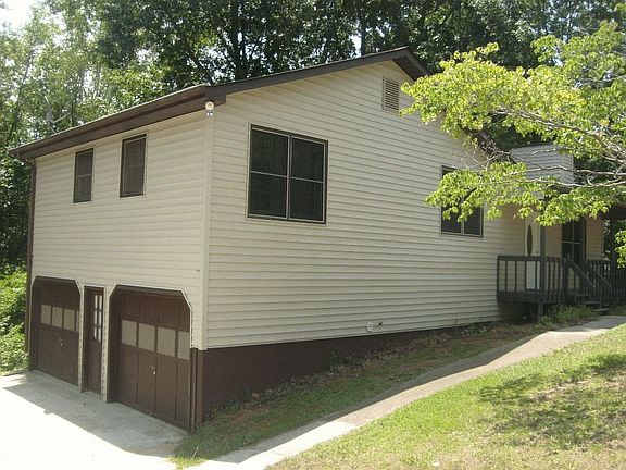 side view of house with 2 car garage