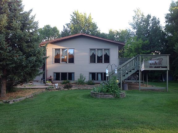 Side view with yard and deck