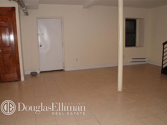 3rd image of 256 E 10th St APT 1F