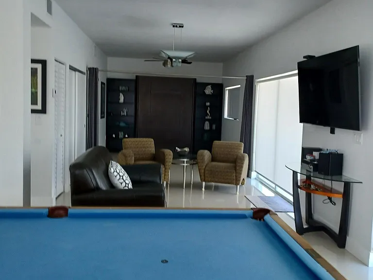SECOND FLOOR GAMEROOM WITH A PULLOUT QUEEN MURPHY BED