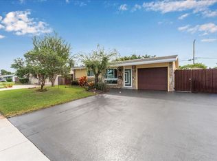 230 NE 58th St, Oakland Park, FL 33334