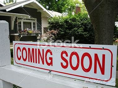 stock-photo-1771330-coming-soon-real-estate-sign-and-home-house