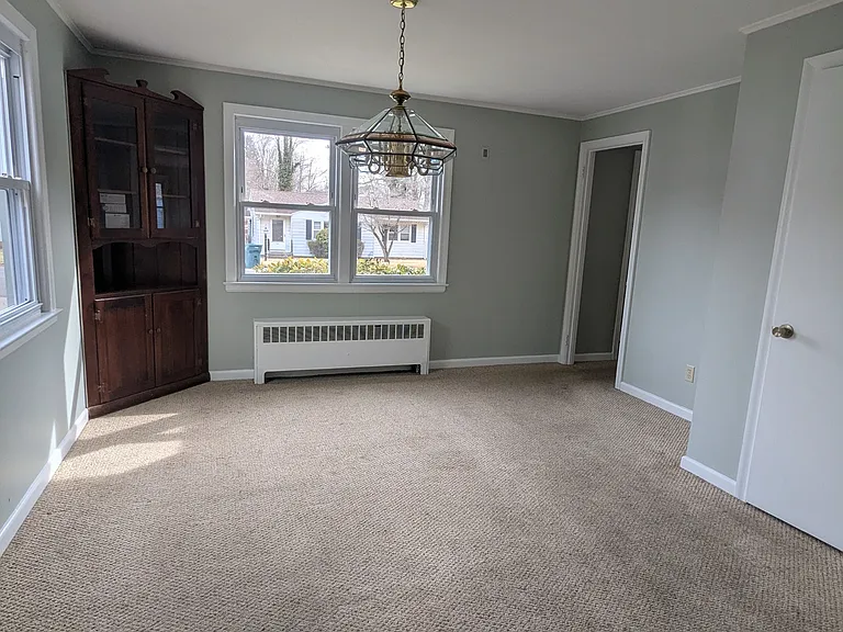 Dining Room with Built in cabinet and pantry closet