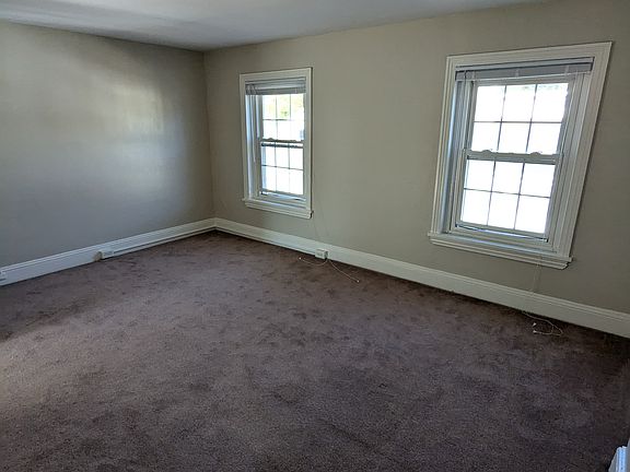 3rd floor master bedroom, alternate view of street-facing windows.