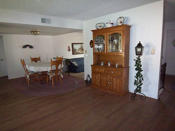 Large Dining area with real wood floors