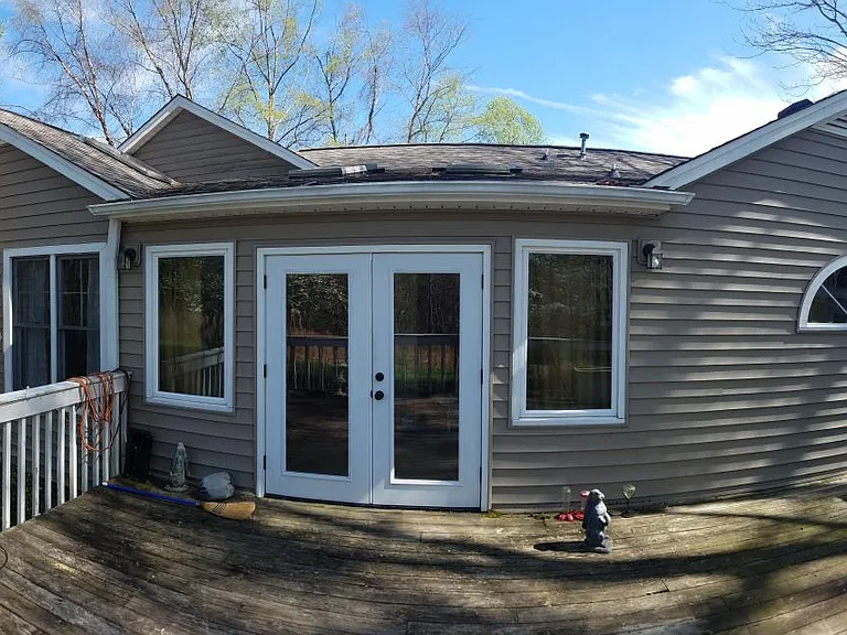 Panoramic view of the house from the rear deck (hence the fish-eye perspective)