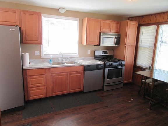Stainless Steel Refrigerator, Microwave, Dishwasher, Gas Oven and Range.