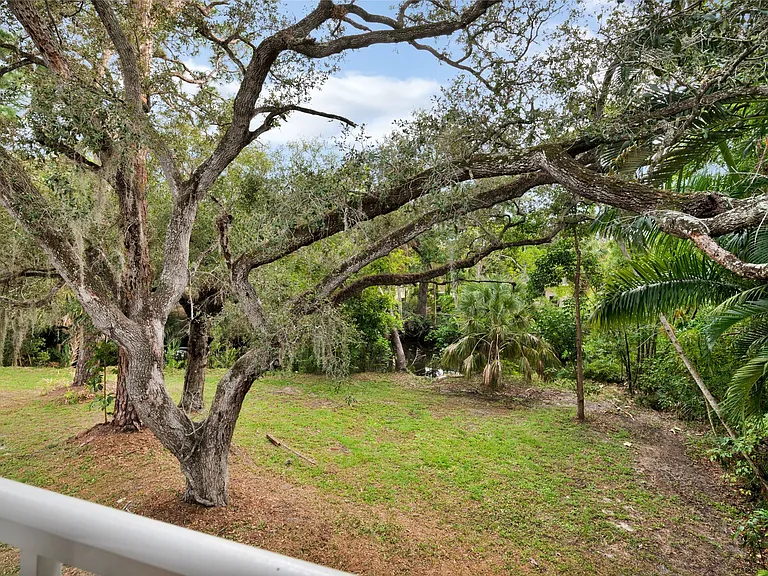 Private elevated view from your Juliet balcony overlooks Oak Creek on the back yard. Let down your hair!
