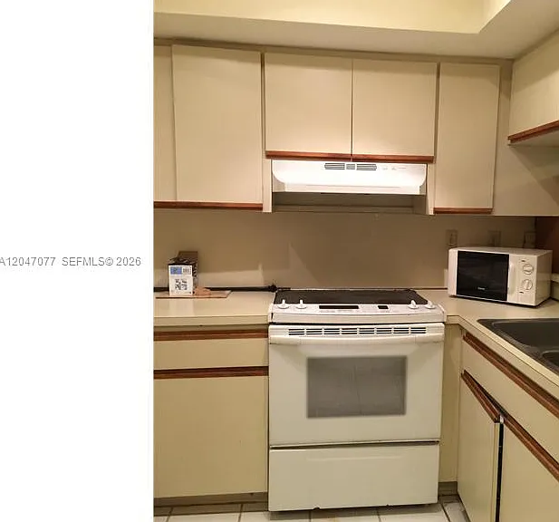 8977 SW 123rd Ct #202 — Photo 2