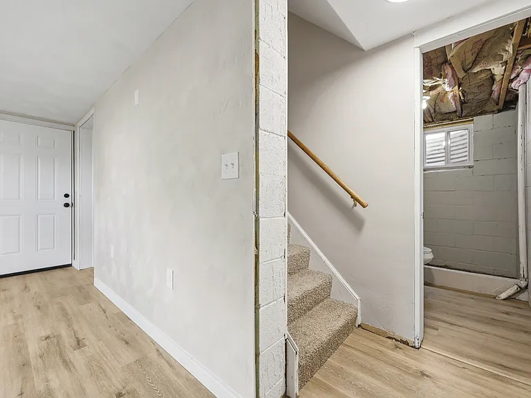 Partially finished basement with new LVT flooring