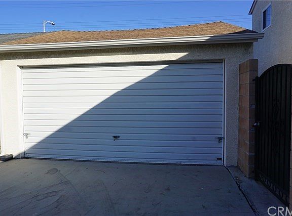 Large Two Car Garage With Automatic Opener and Number Pad Access