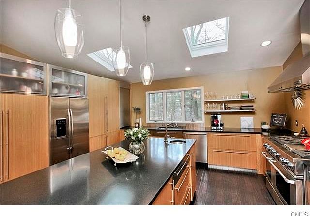 Poggenpohl kitchen, with honed granite counters, anigre cabinets are waiting for you at 5 Pink Cloud Lane.