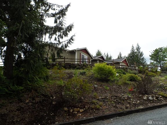 First view of your home while heading up the driveway.