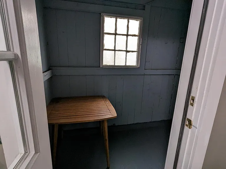 Rear 3 season enclosed porch