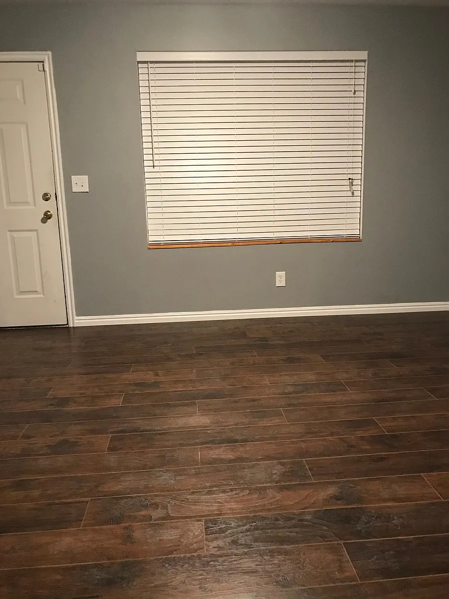 Living room with big picture window - 434 W 7th St