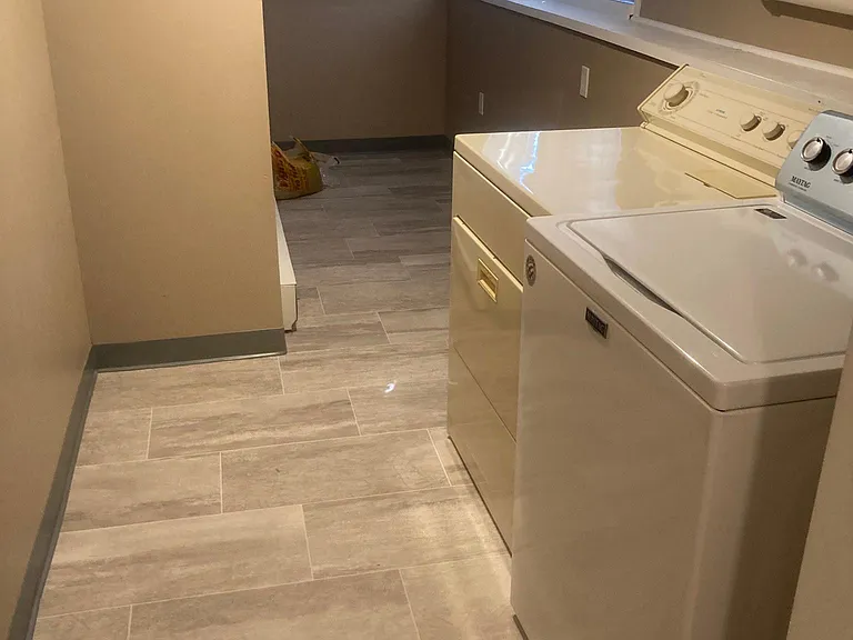 IN UNIT LAUNDRY AND STORAGE ROOM