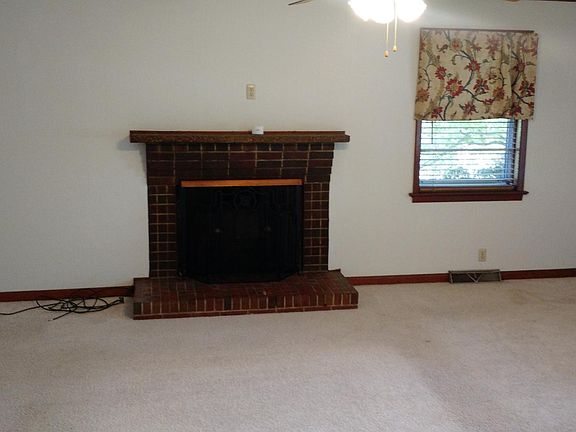 Decorative brick fireplace in Living area