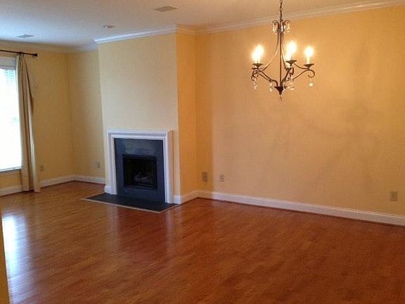 Open living room with hard wood floors
