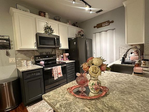 2nd image of 875 GRAND REGENCY POINT #203