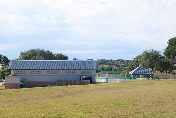 Pool at Lake Front Amenity Center, less than a mile from lot.