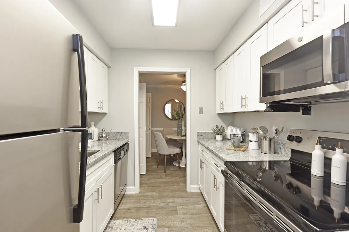 Kitchen with granite counters and stainless appliances - 421 at Whitsett